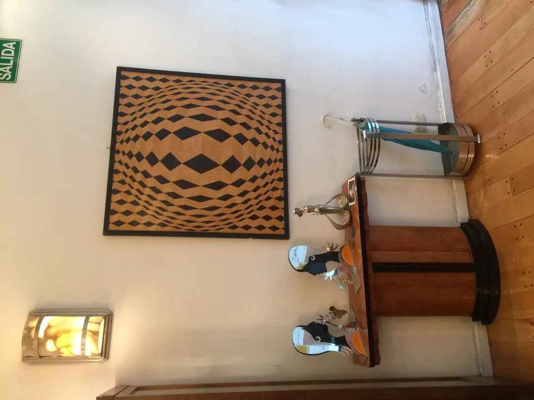 Pair of antique sconces with elegant design and soft light.