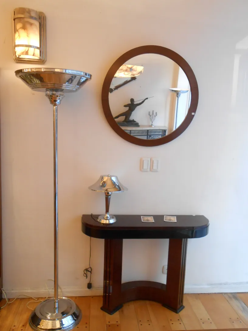 Pair of antique wall sconces in an elegant setting.