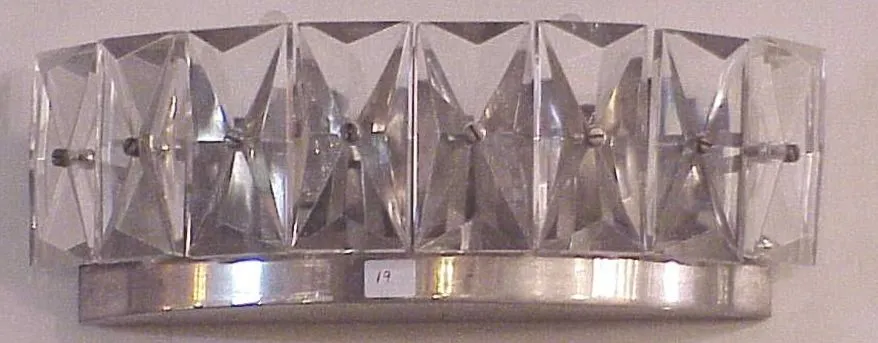 Antique pair of sconces featuring faceted crystal details