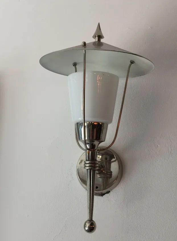 Antique pair of sconces with metal base and white shade