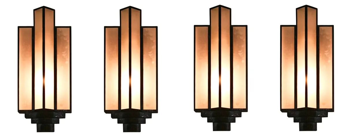antique pair of sconces with a soft glow and elegant design