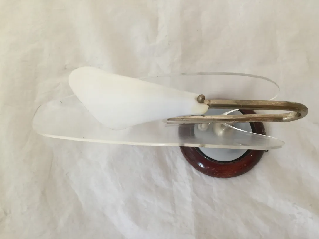 Antique pair of sconces featuring soft light and curved design with opaline glass.