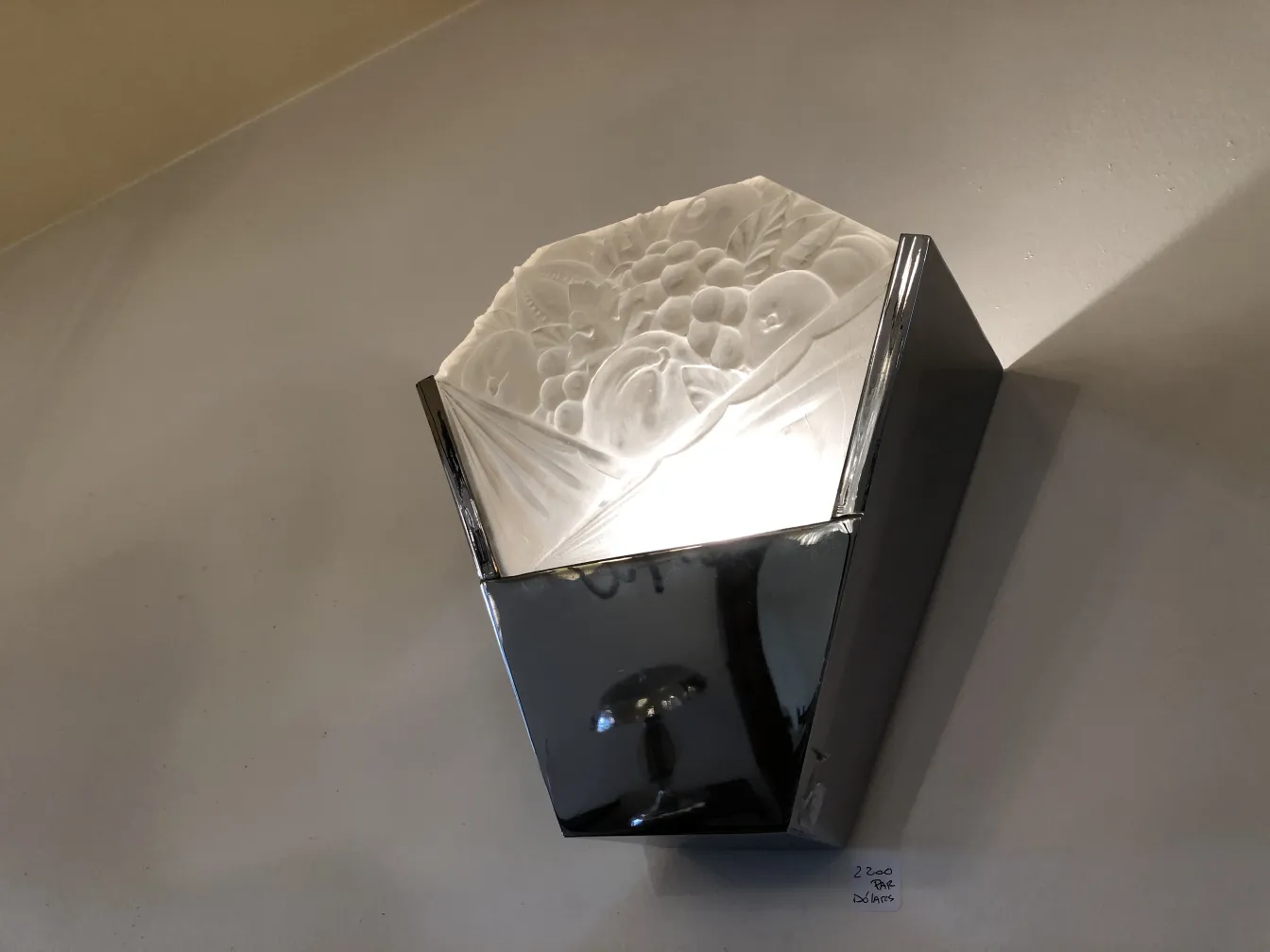 Antique wall sconce with elegant design and visible details