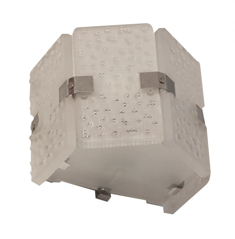 Antique wall sconces with translucent design and decorative details, perfect for lighting spaces.