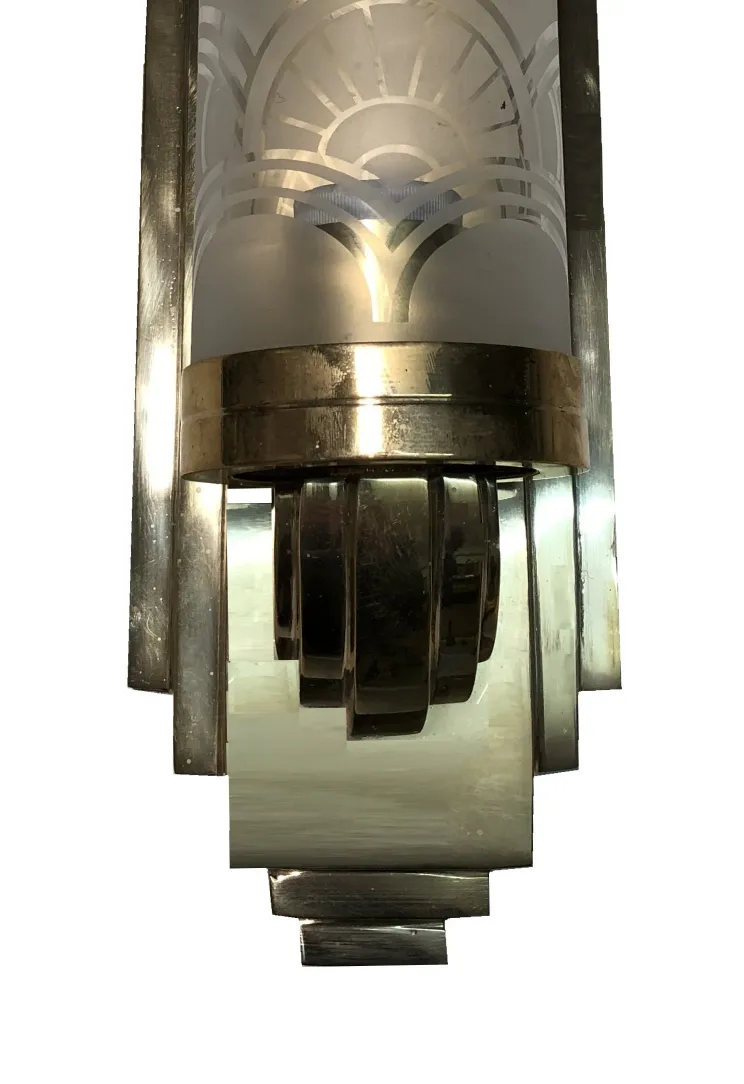 Elegant pair of antique sconces with a sophisticated design.