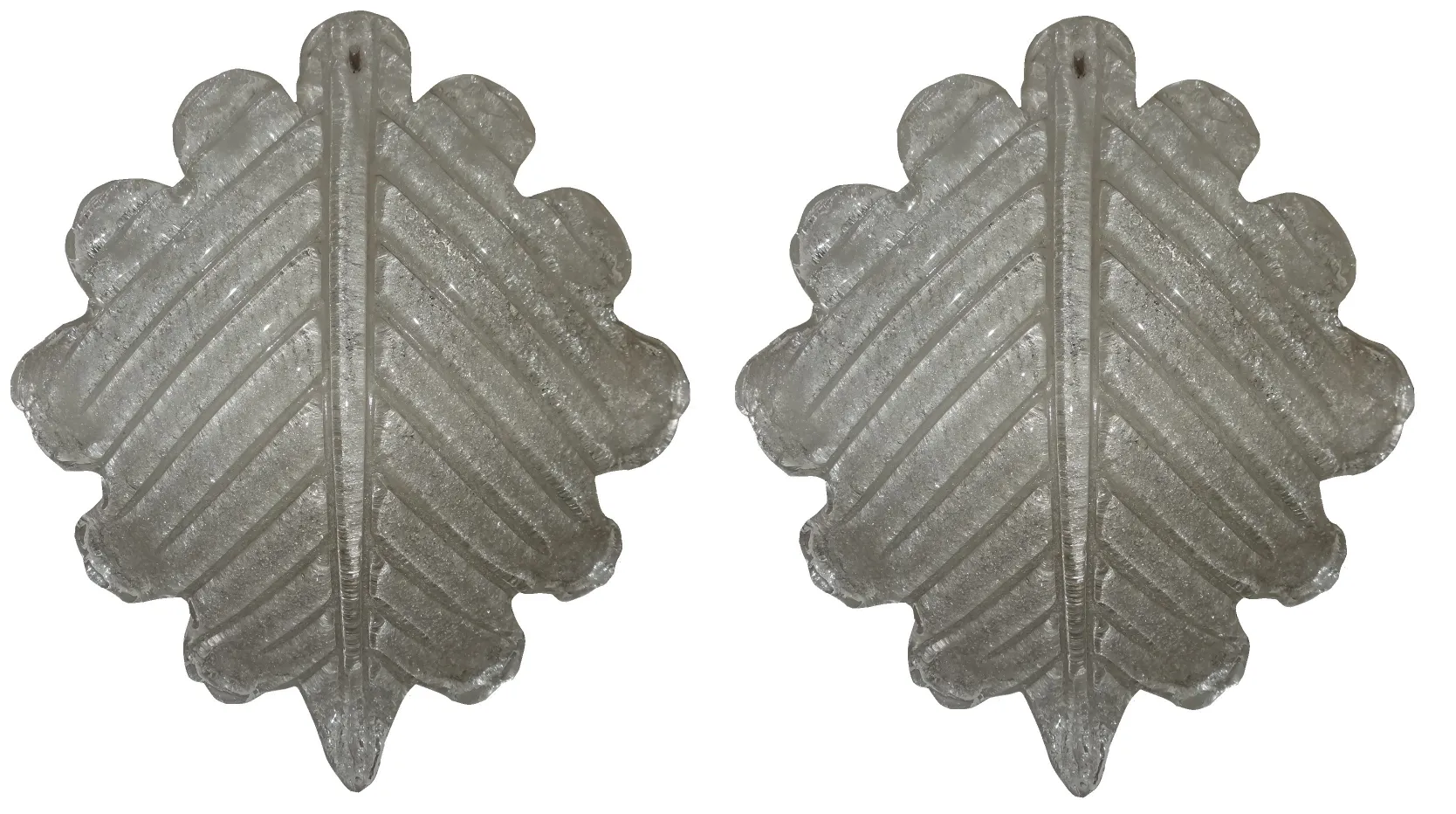 Antique sconces in leaf shape, perfect for decoration.