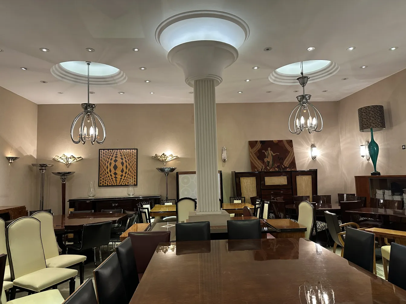 Pair of antique sconces illuminating an elegant dining area