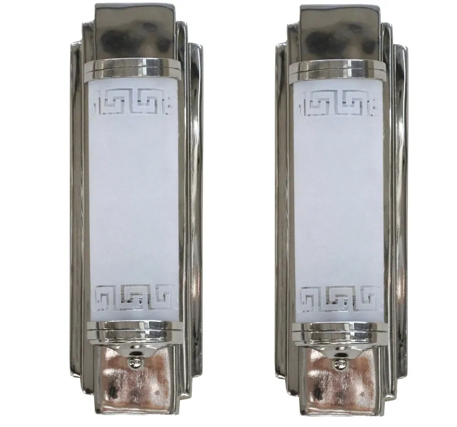 antique pair of elegant sconces with soft light