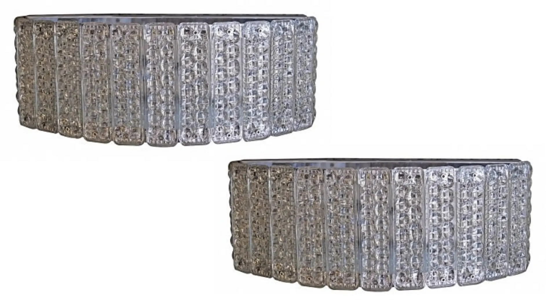 Elegant pair of antique sconces with intricate design.