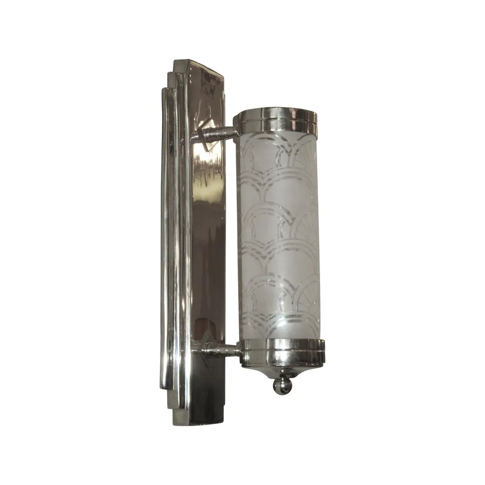 Pair of antique sconces with elegant design and clear glass