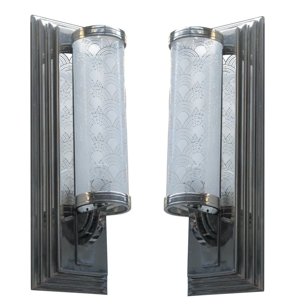 Antique pair of sconces with elegant design.