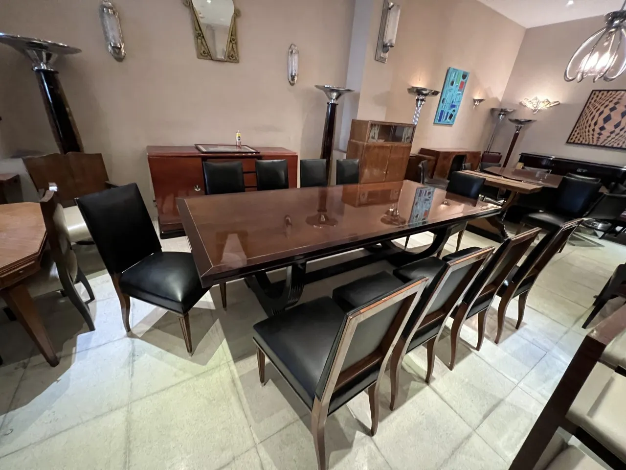 Antique pair of sconces next to a dining table