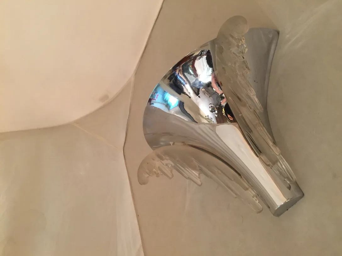 Antique and elegant pair of sconces with a stylish design