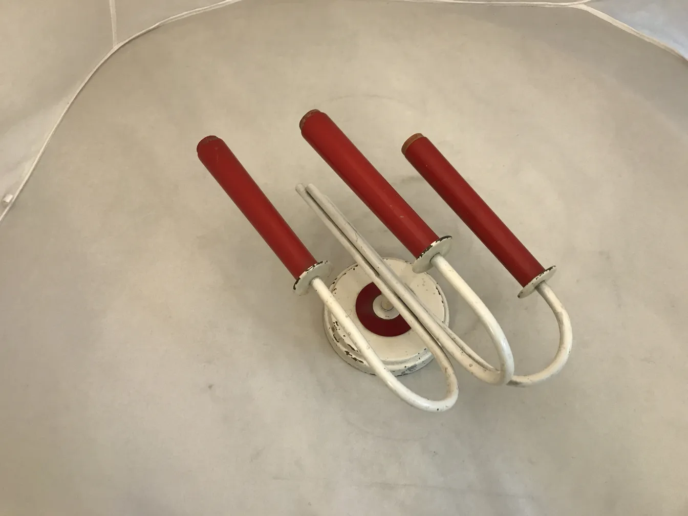 Antique pair of sconces with red and white details by Jean royère.