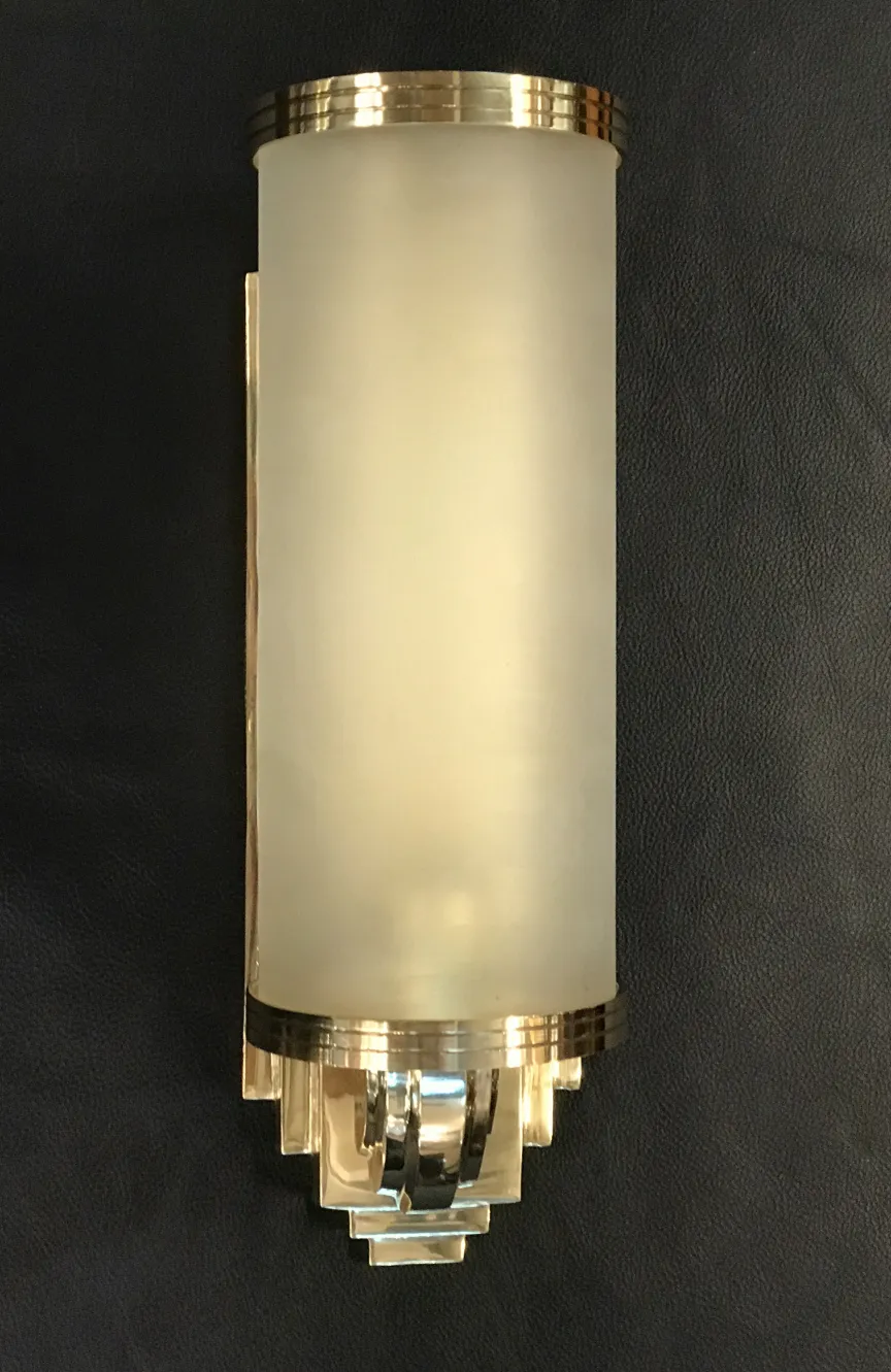 Pair of antique sconces with frosted glass in classic golden style