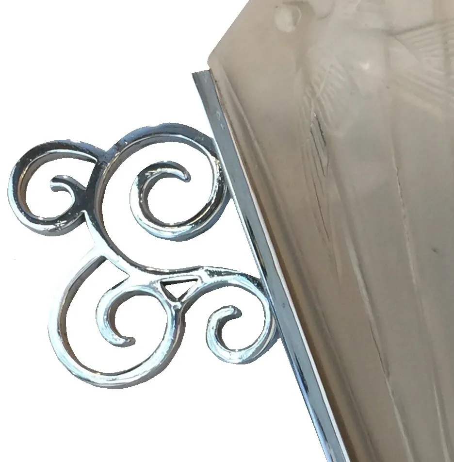 Antique sconces with curved accents in a stylish setting.