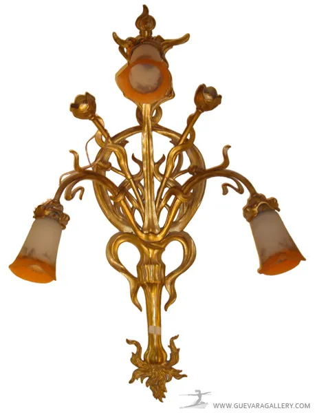 antique sconces with floral design and gold details