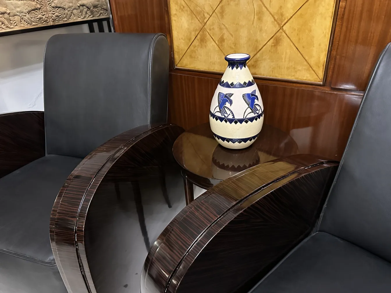 Antique ceramic vase with blue decorative patterns, classic style.