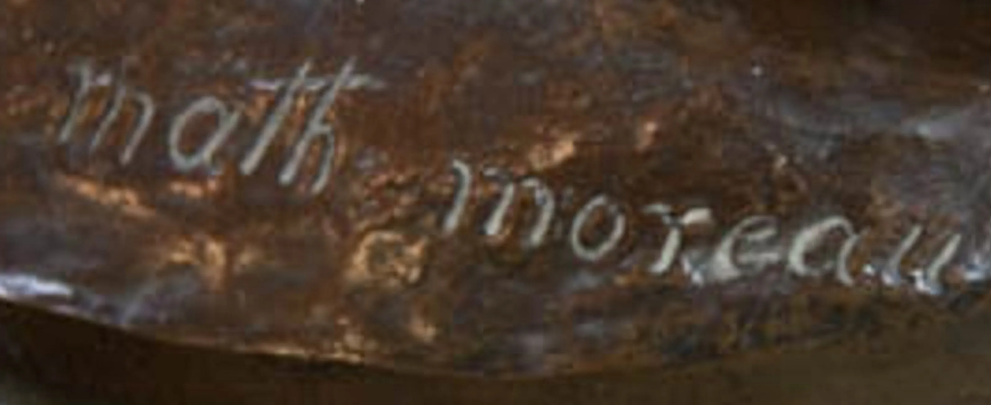 Antiguo sello Math. Moreau con inscripción visible en un fondo claro.