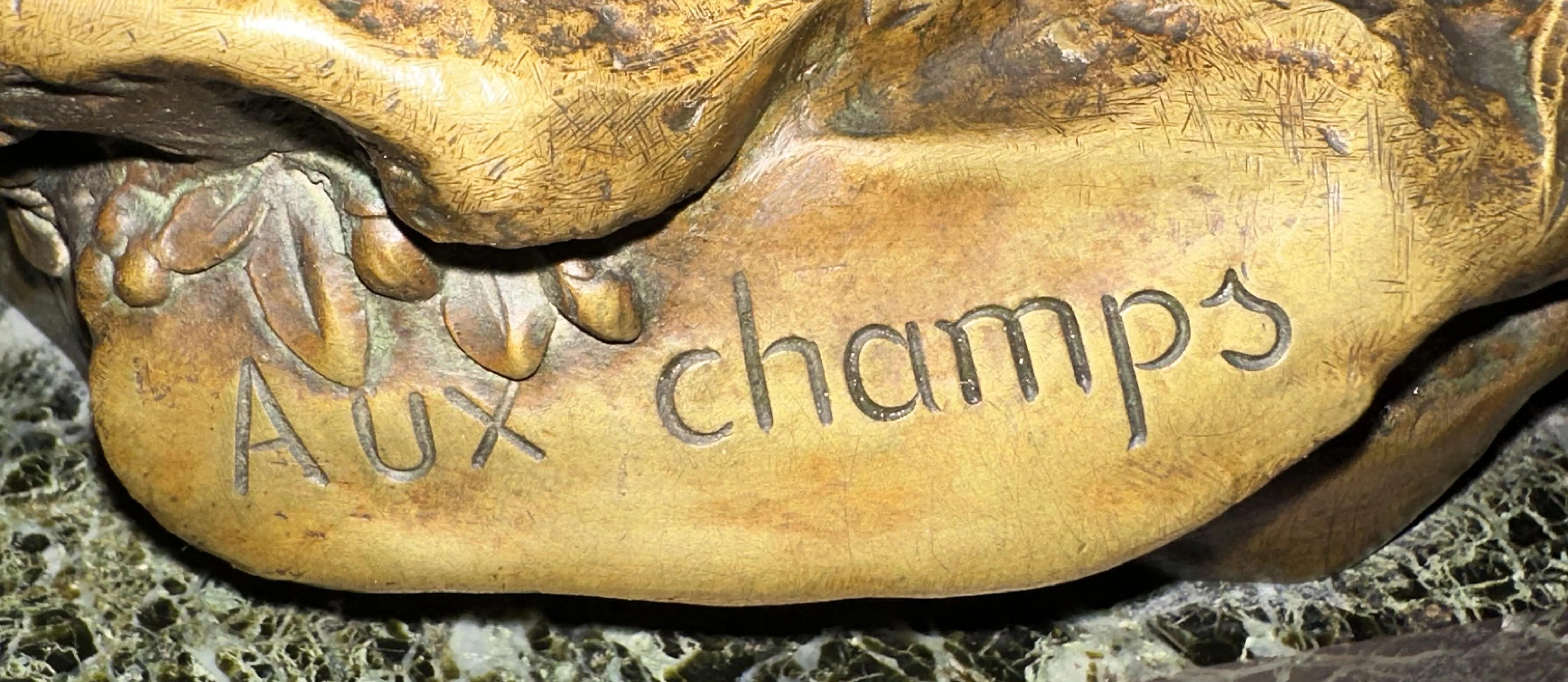 sello antiguo con inscripción 'Aux champs'