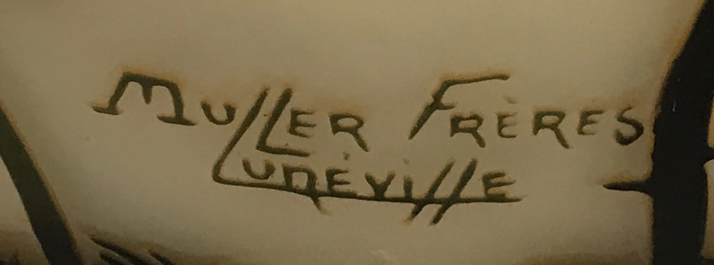 sello antiguo Muller frères Lunèville con detalles decorativos