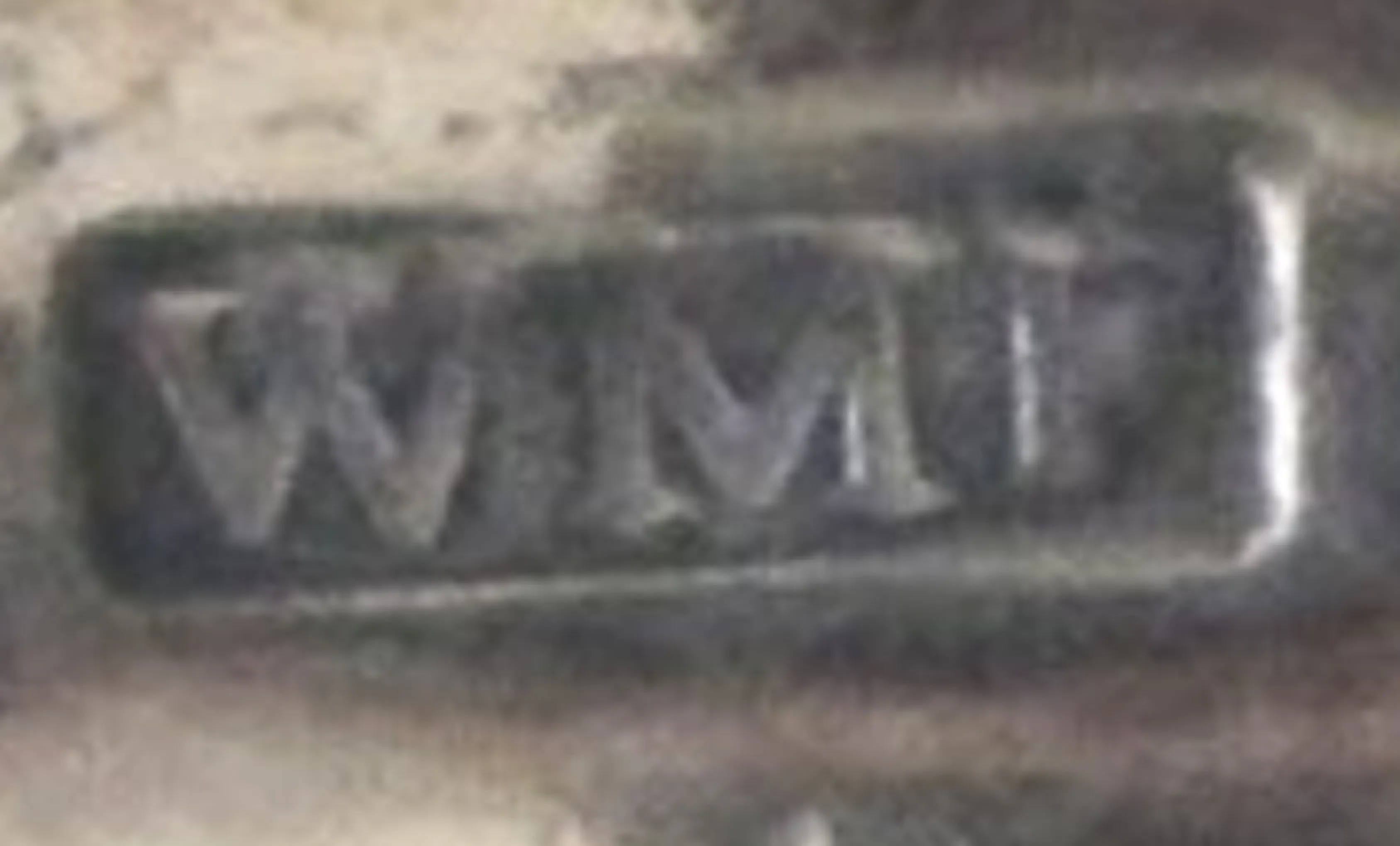 sceau WMF ancien avec détail de surface, inscription claire