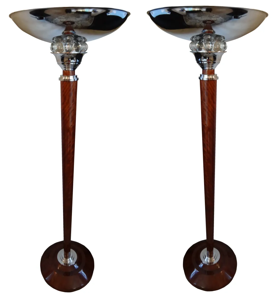 two elegant antique floor lamps with shiny details