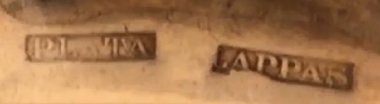 Antico sigillo con l'iscrizione Plata Lappas sulla superficie.