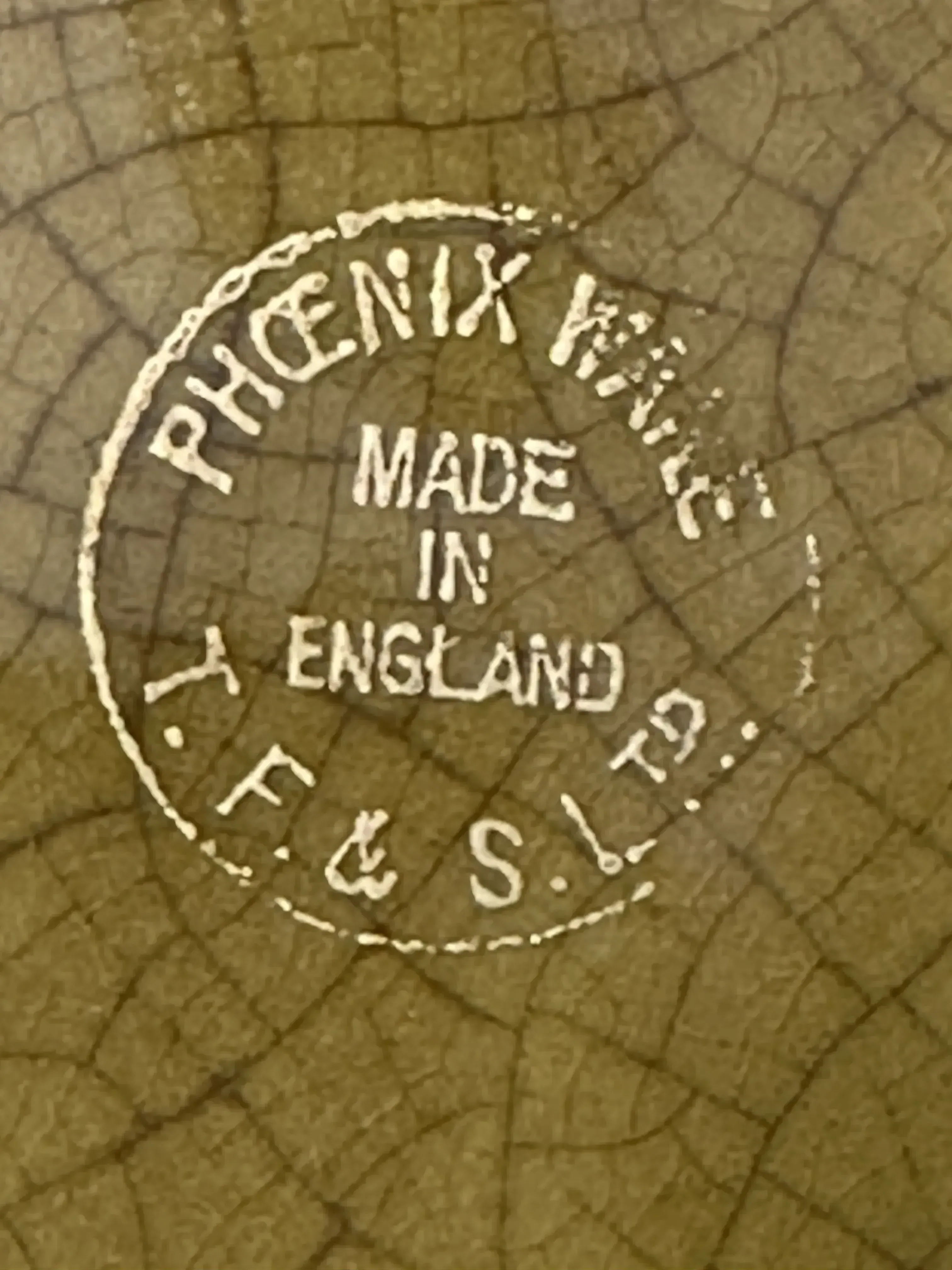 sigillo antico di Phoenix Wake con iscrizione in inglese, sfondo neutro